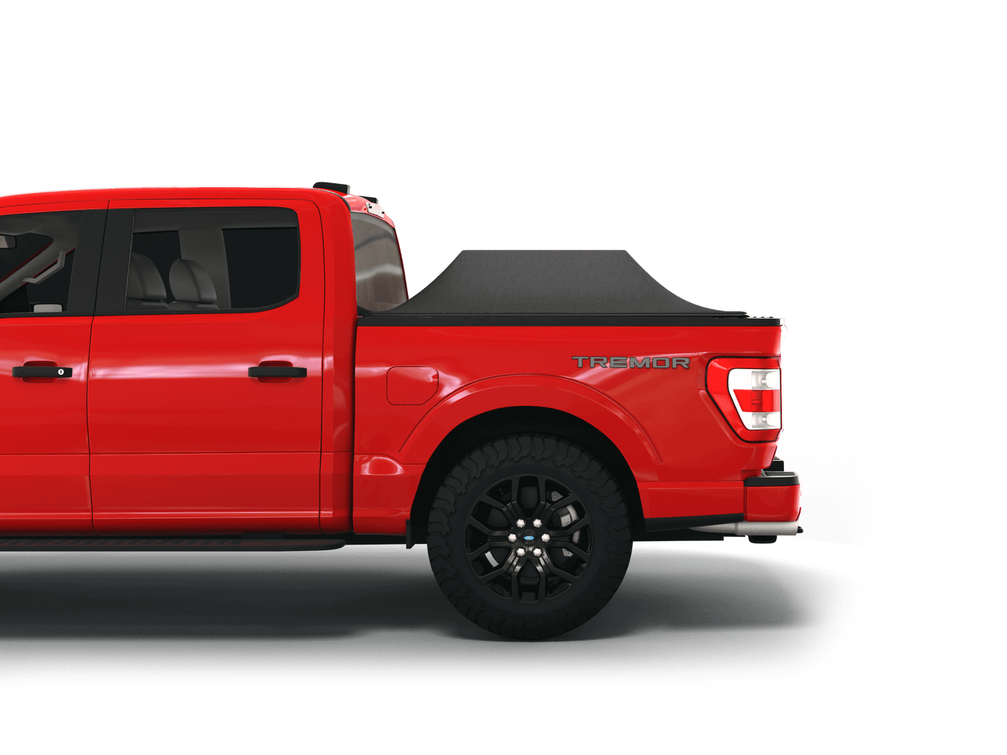 Red Ford F-150 with Sawtooth Stretch tonneau cover expanded over cargo load